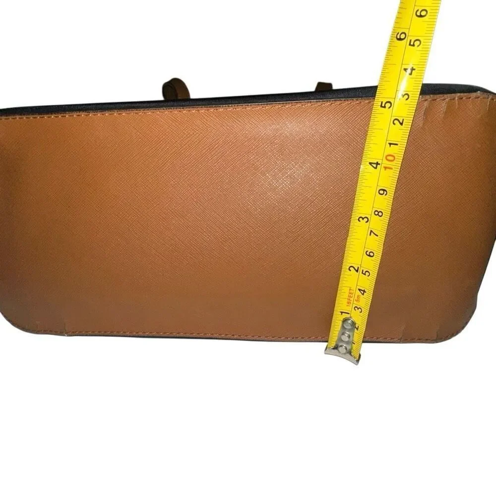 Michael kors black purse w/ tan trim 6 pockets